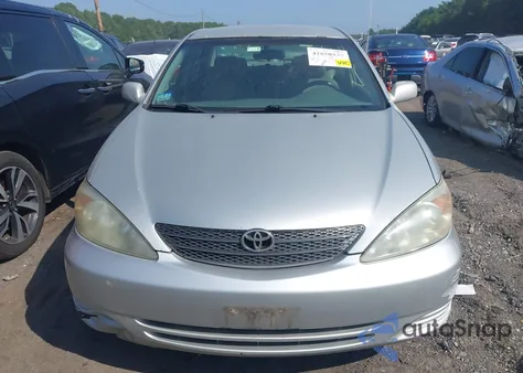 2002 Toyota Camry Le from USA, damaged, VIN 4T1BE32K42U504553